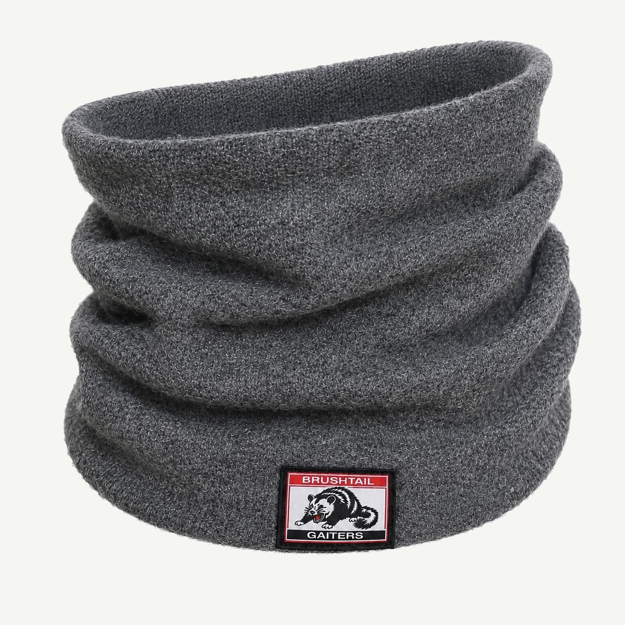 Brushtail Neck Gaiter i kolgrå, stående produktfoto.